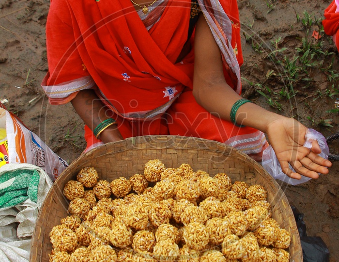 Tribal Woman Selling local Sweets