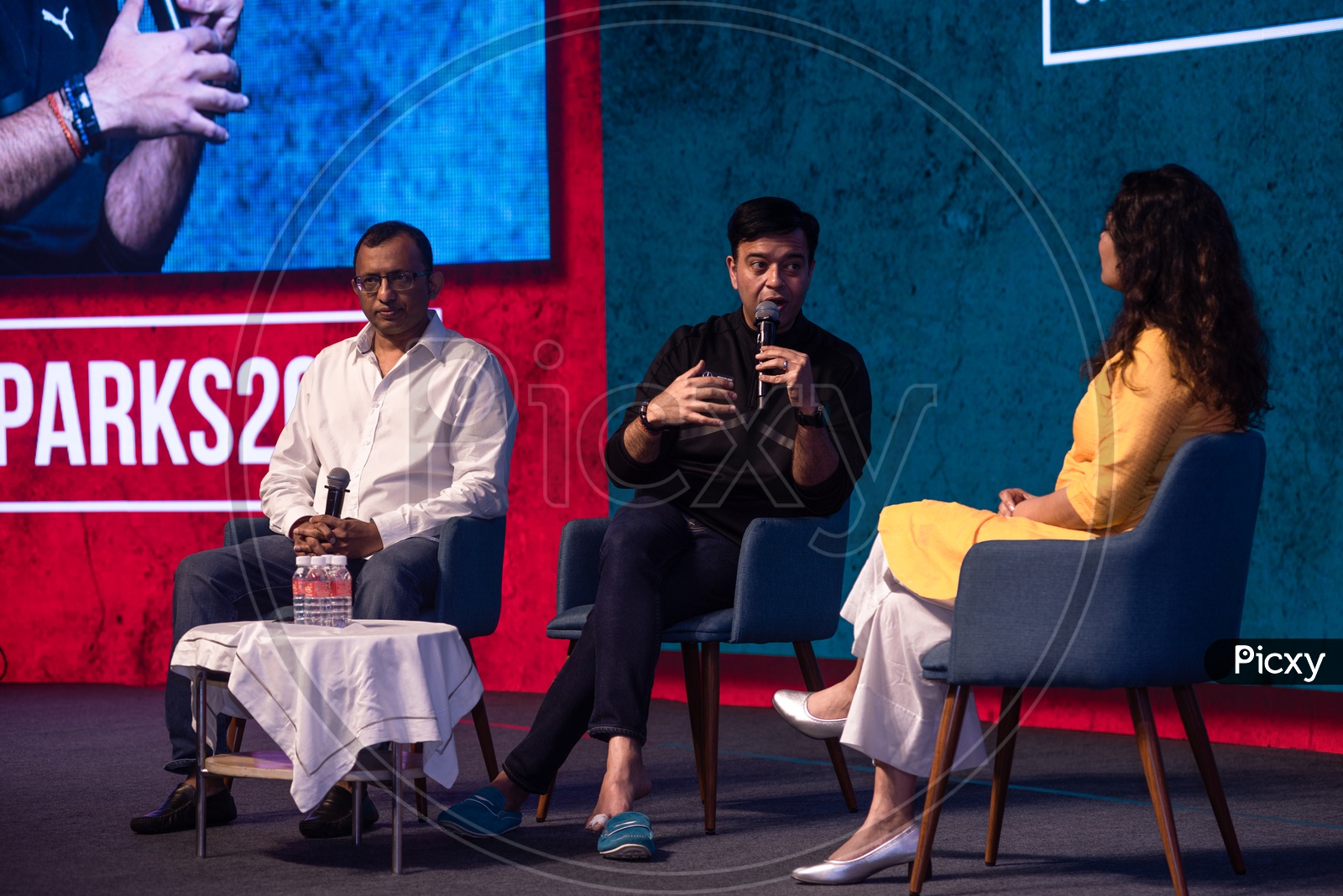 Rajendra Gupta( Founder and CEO,DailyHunt) Umang Bedi(President,DailyHunt) and Shradha Sharma(CEO,YourStory) at TechSparks 2018