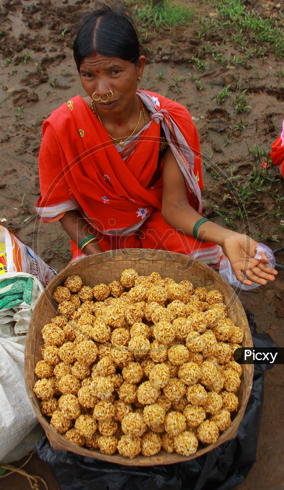 Tribal Woman Selling local Sweets