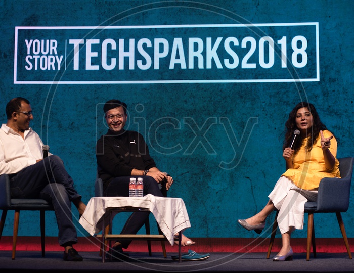 Rajendra Gupta( Founder and CEO,DailyHunt) Umang Bedi(President,DailyHunt) and Shradha Sharma(CEO,YourStory) at TechSparks 2018