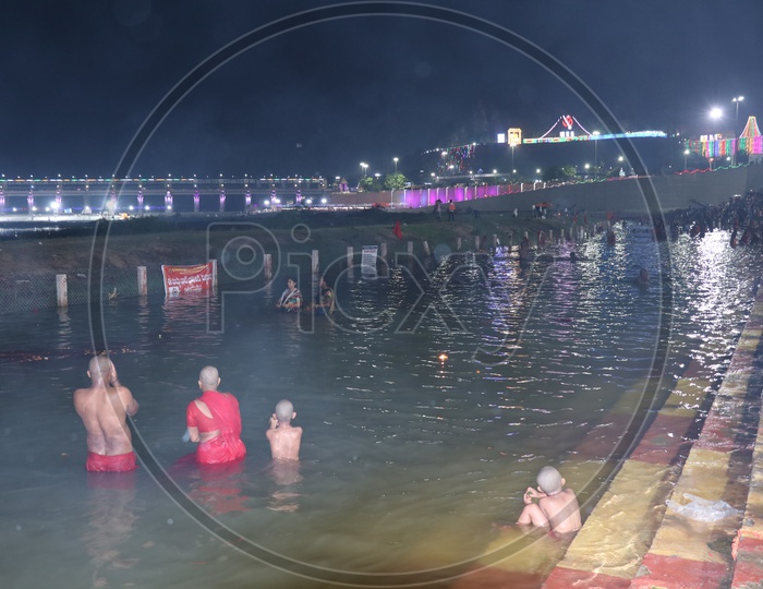 pilgrims/Devotees bathing on 9th day of Durga Navrathri's uring Dasara/Dussehra