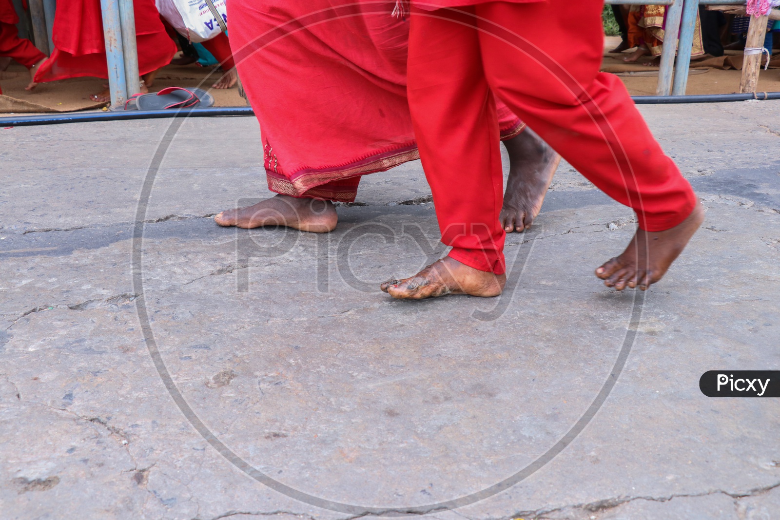 A bhavani with injured feet walking up the hill to reach the temple of Goddess Durga on 9th day of Durga Navrathri's uring Dasara/Dussehra