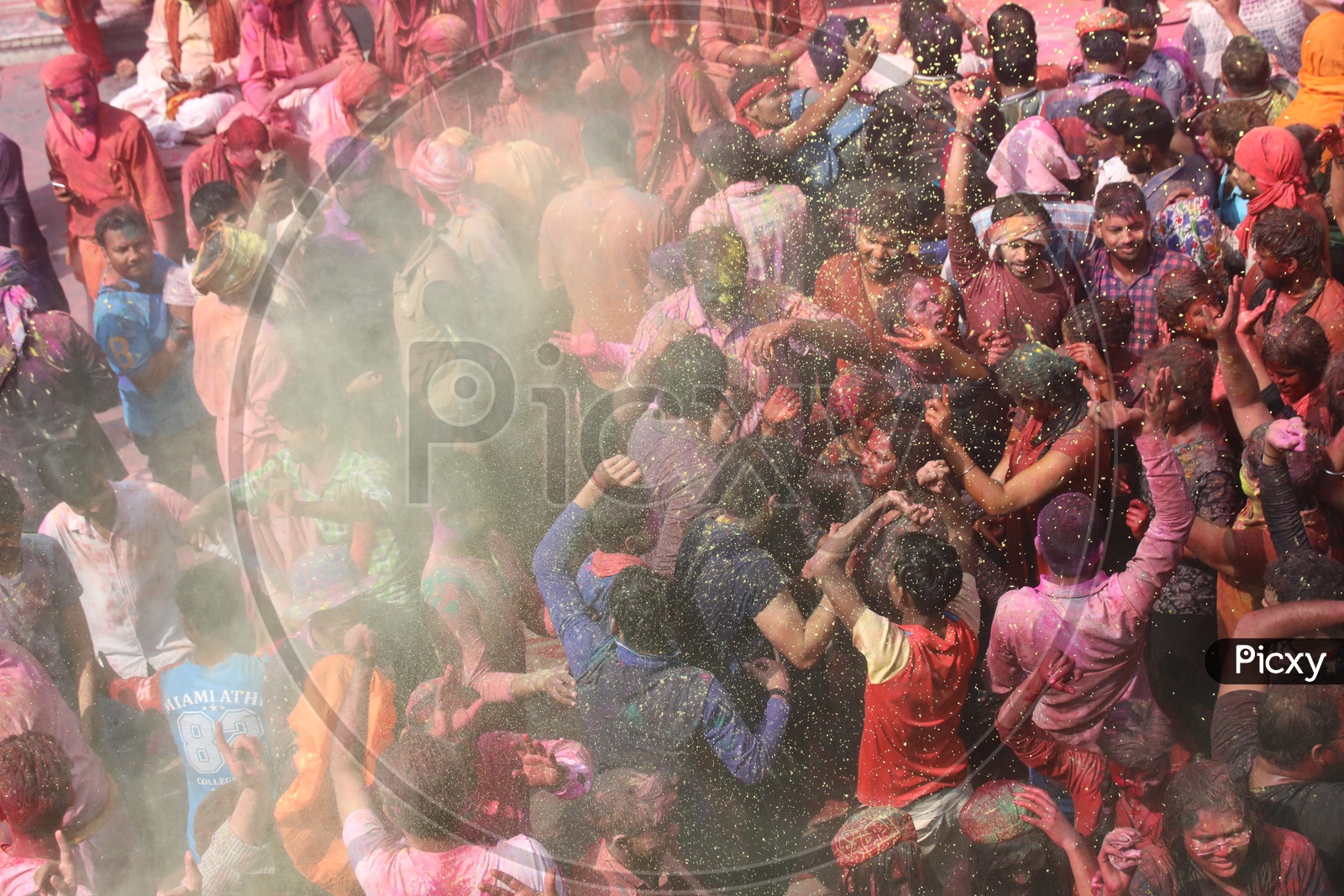 People Celebrating Holi Festival in Nandgaon