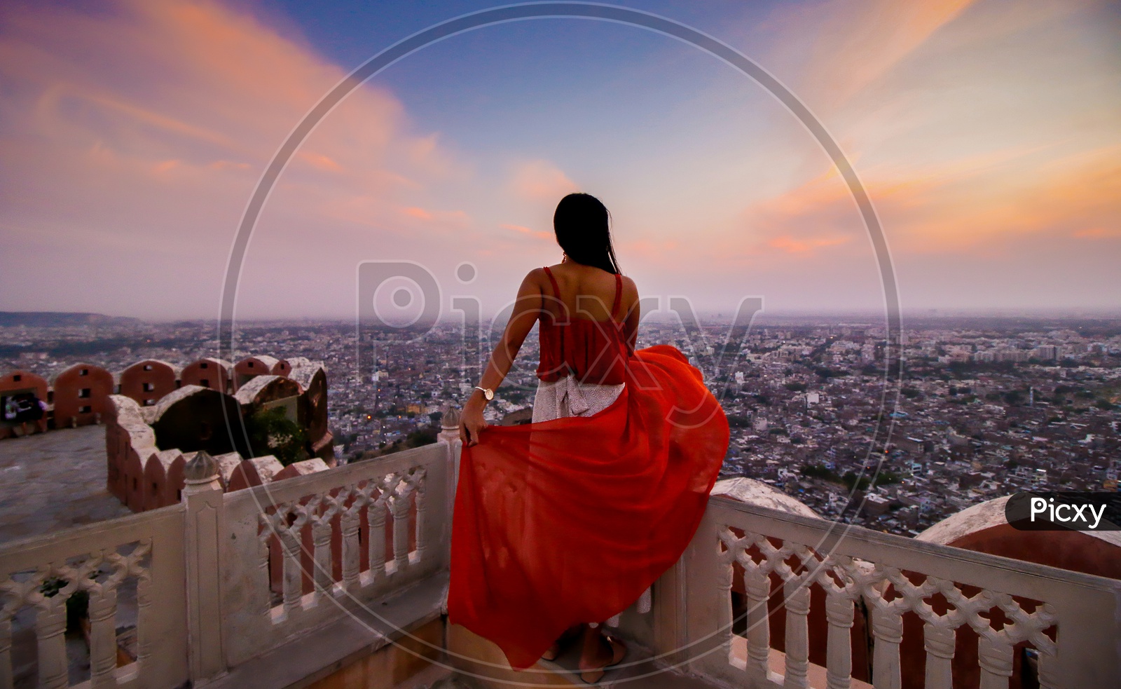 Sunset and the Lady in the Pink City