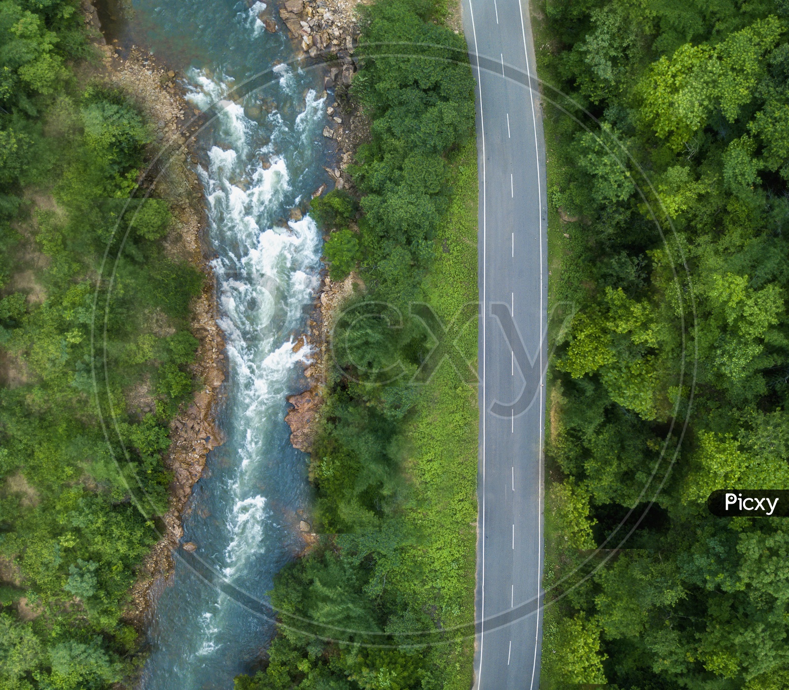 Aerial View of Water flowing and Road