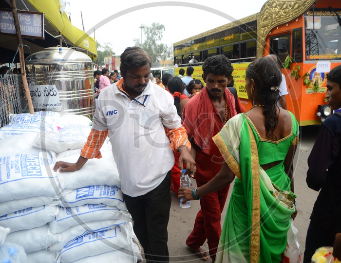 Water bottle distribution for devotees
