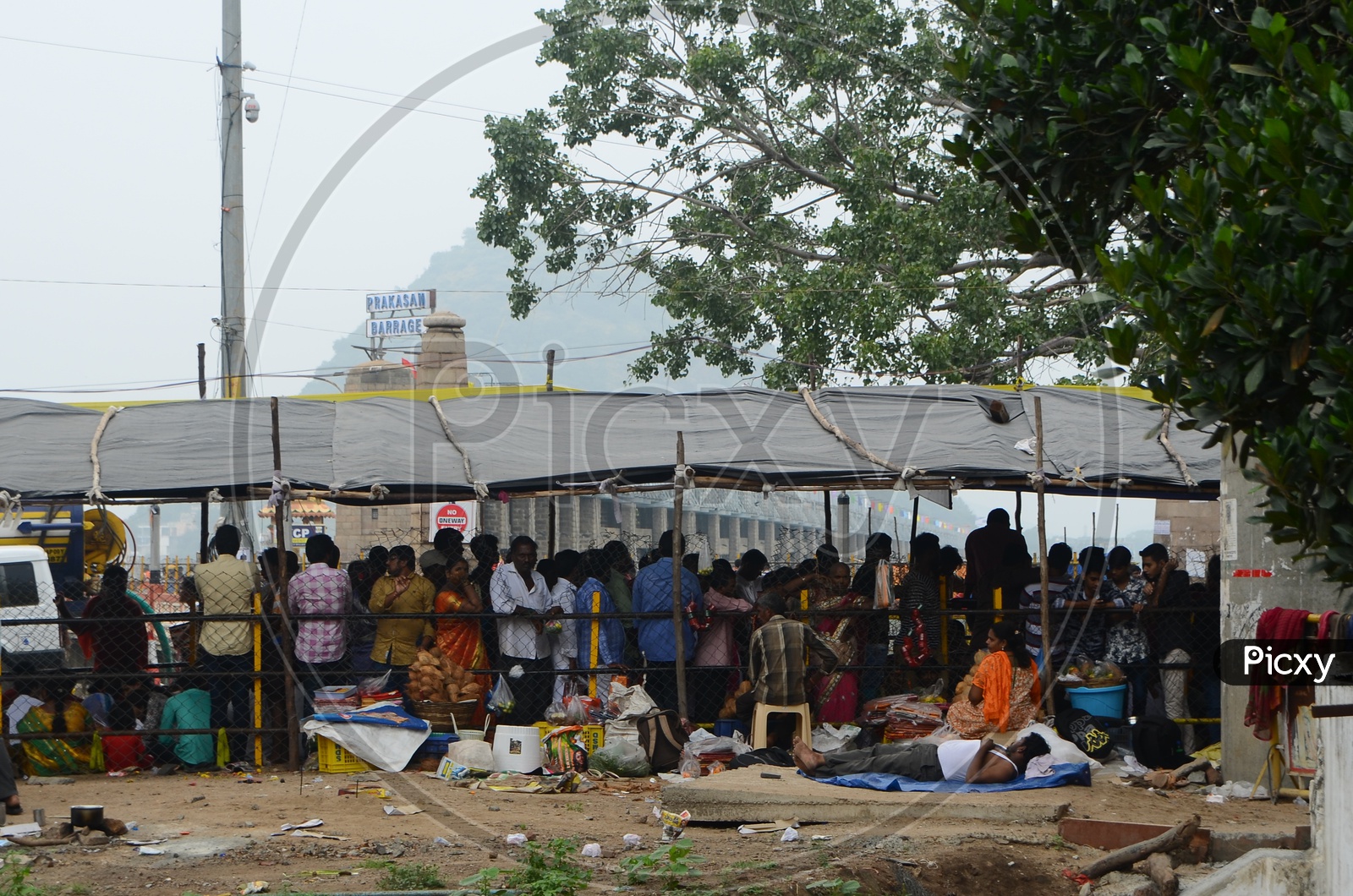 Hindu devotees wait in the queue line for darshan of Goddess Kanaka Durga.