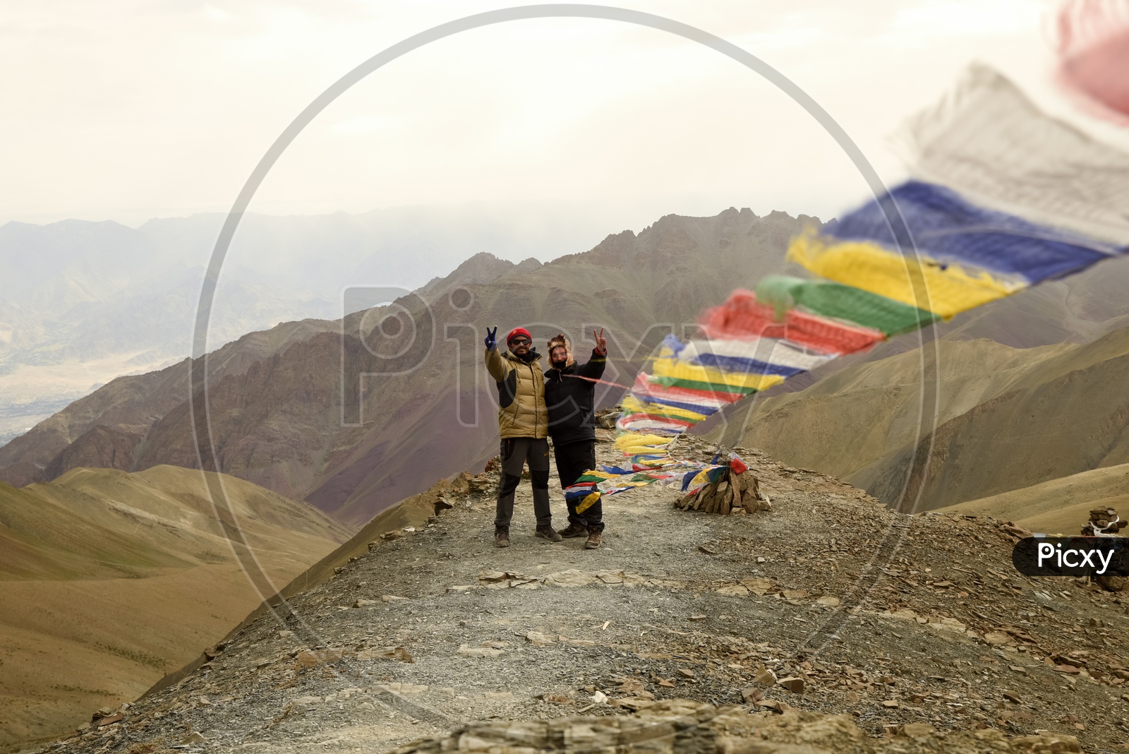 Climbers with Tibetan prayer flags.