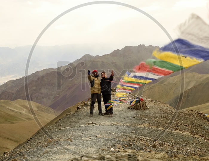 Climbers with Tibetan prayer flags.