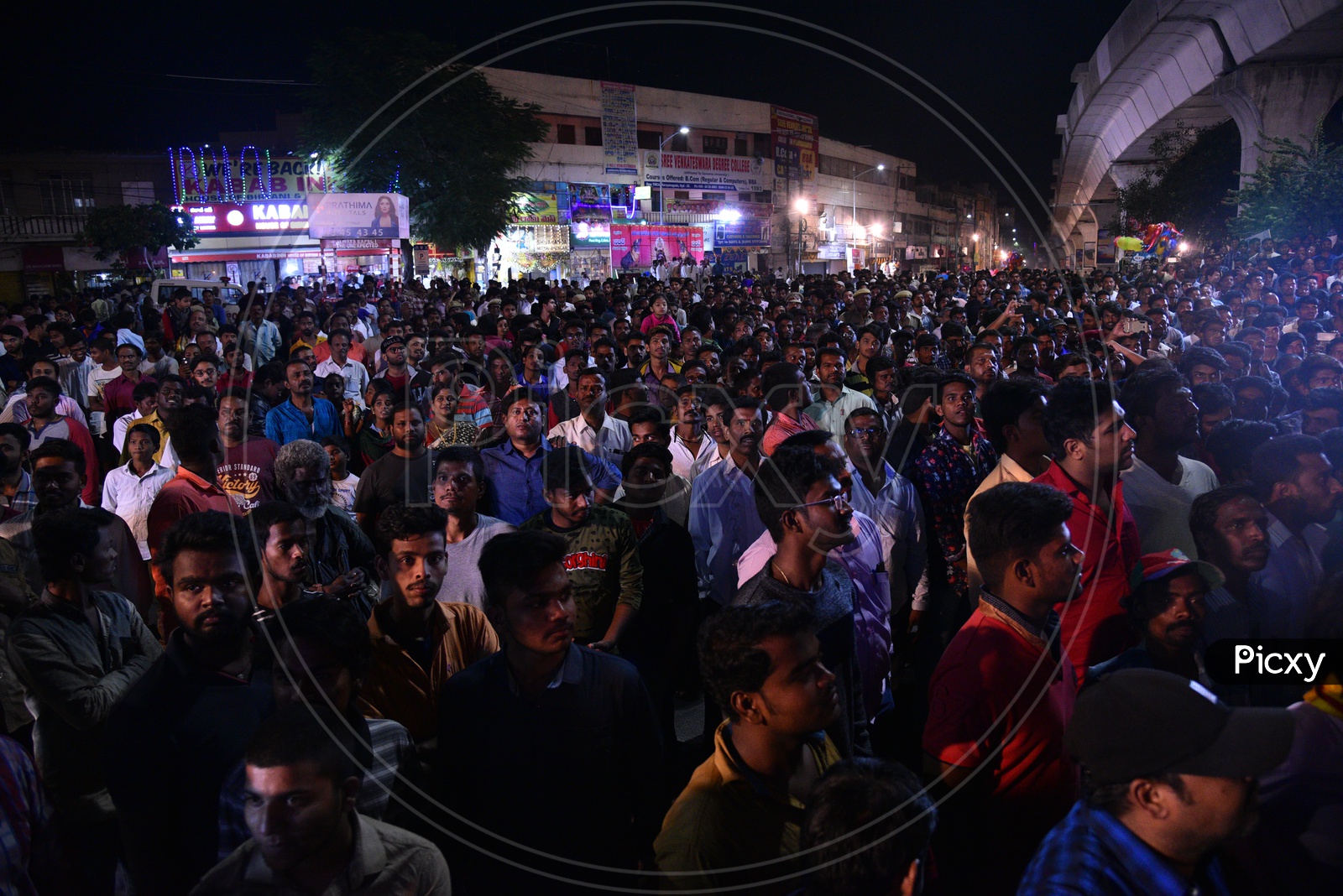 People gather around YMCA Circle in Narayan Guda and watch the Carnival