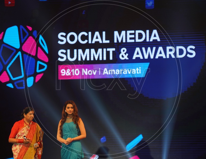 Women Commission chairperson Nannapaneni Rajakumari and Payal Rajput in Social Media Summit & Awards Amaravati 2018