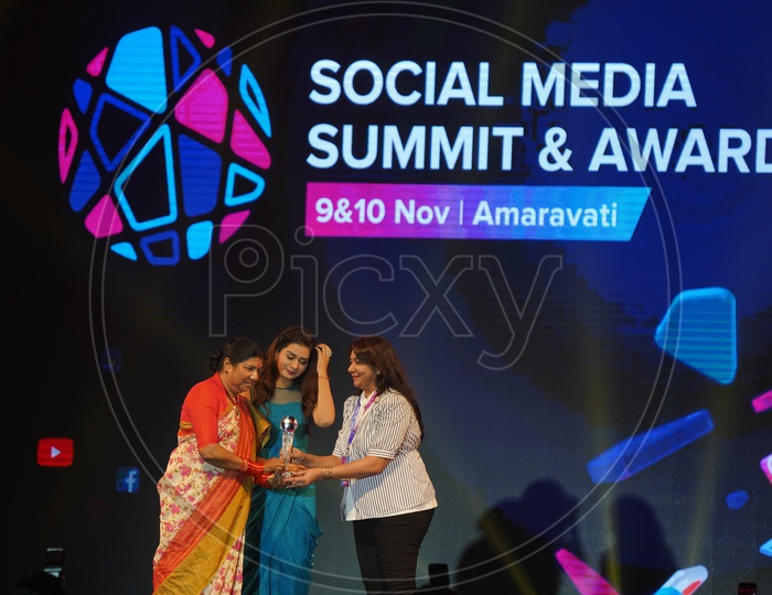 Women Commission chairperson Nannapaneni Rajakumari and Payal Rajput in Social Media Summit & Awards Amaravati 2018
