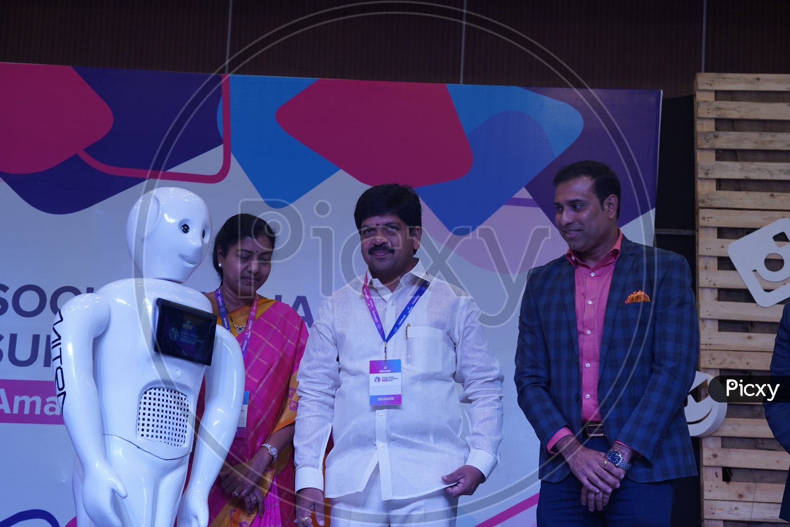 Image Of AP Minister Kollu Ravindra And Former Indian Cricketer V V S 