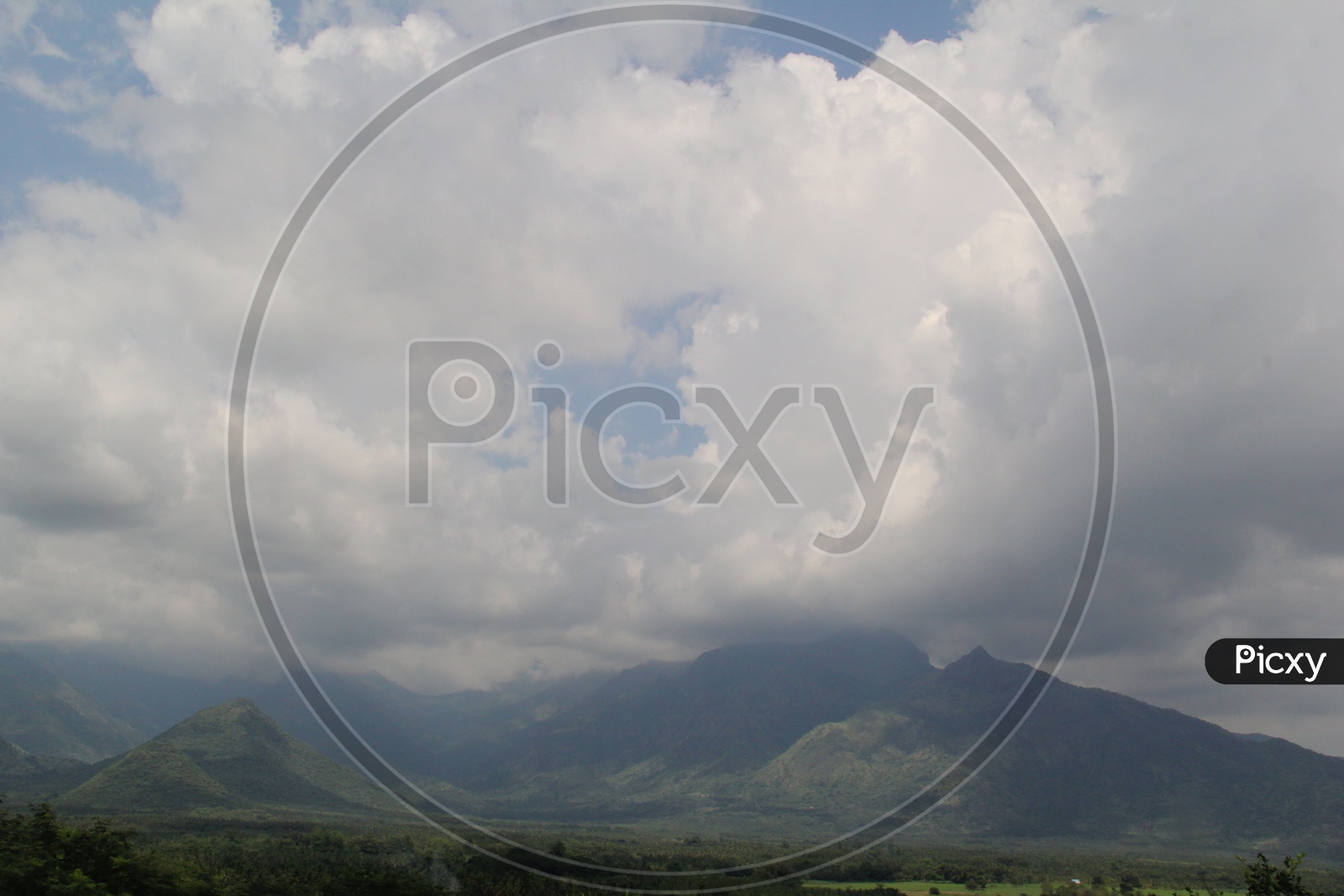 Beautiful Landscape of Munnar Mountains with Clouds