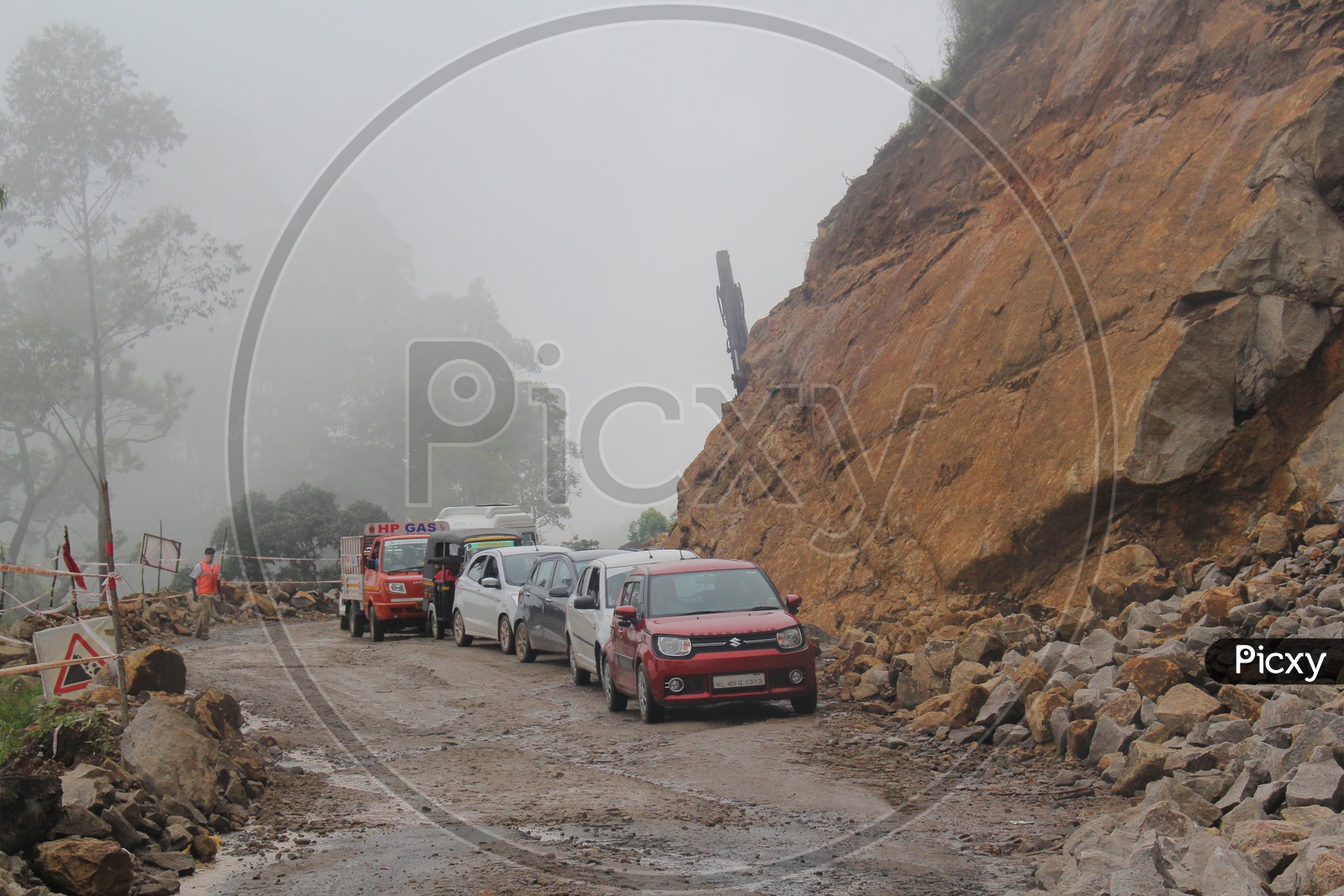 Cars Lined up parallel on a Ghat Road