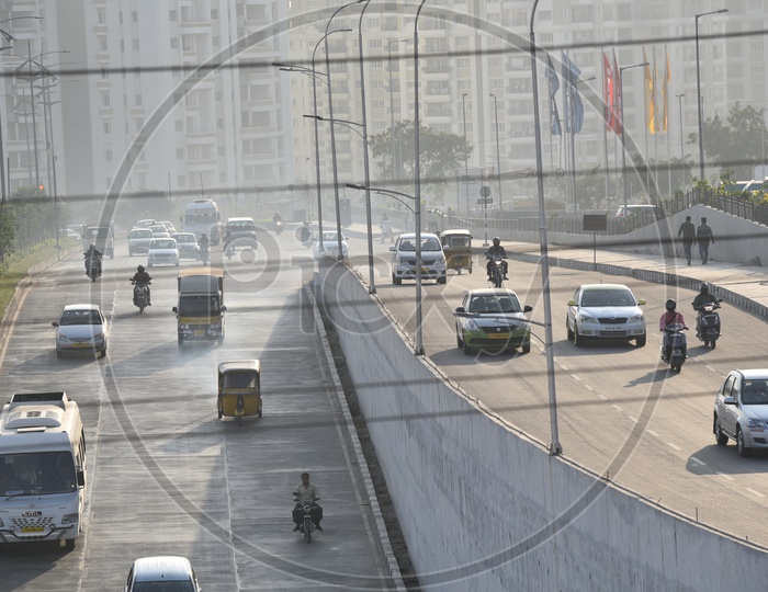 Vehicles head towards Underpass and towards Mindspace Junction
