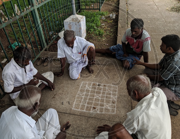 Villagers playing retro board games