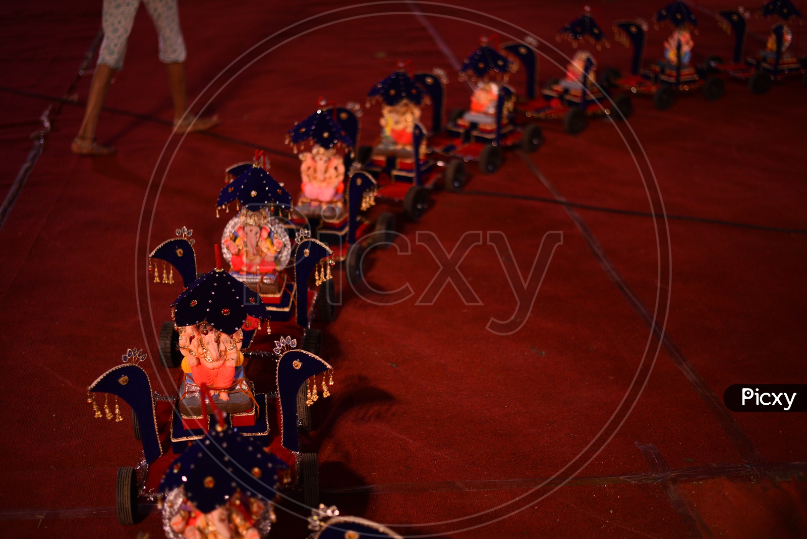 A trolley with Hindu Elephant God, Ganesh/Ganapati/Vinayaka Idols