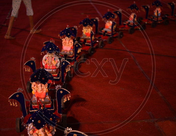 A trolley with Hindu Elephant God, Ganesh/Ganapati/Vinayaka Idols