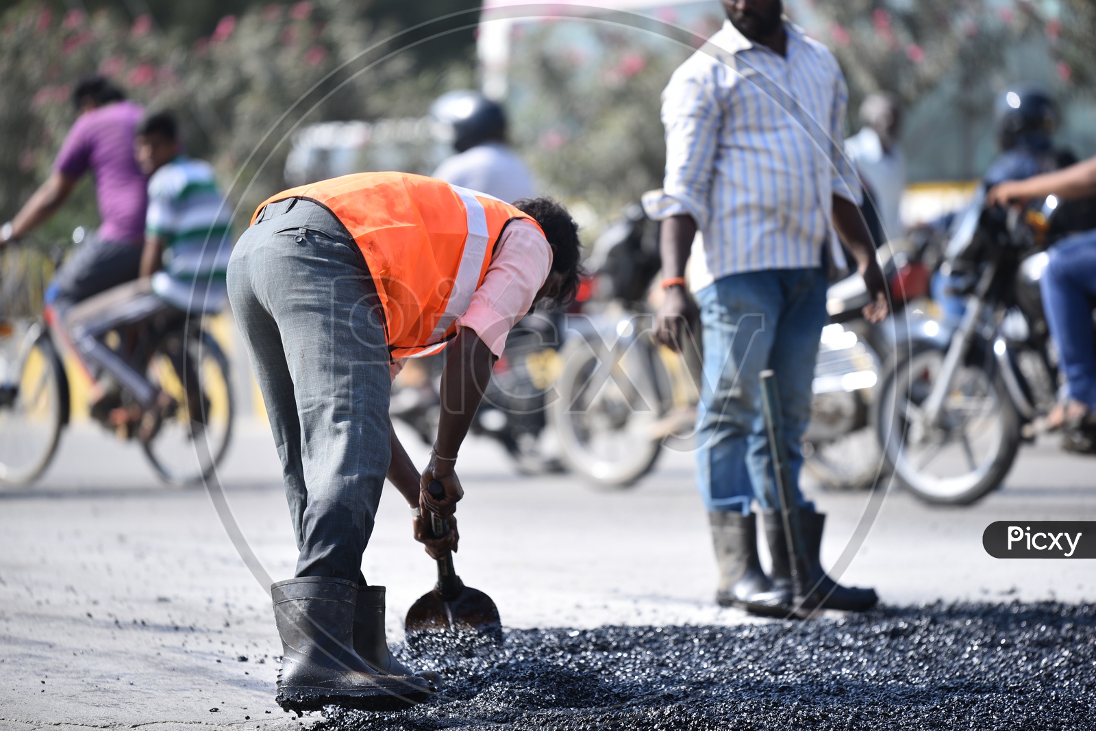 Road repair works by GHMC