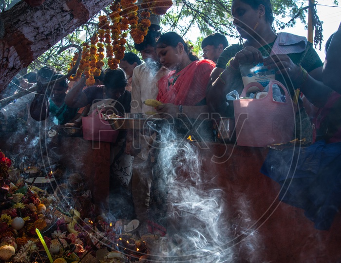Nagula Panchami/Chavithi, observed on the fourth day of deepawali observed by married women and men offering Eggs and Milk to Snakes especially Cobra's near snake pits