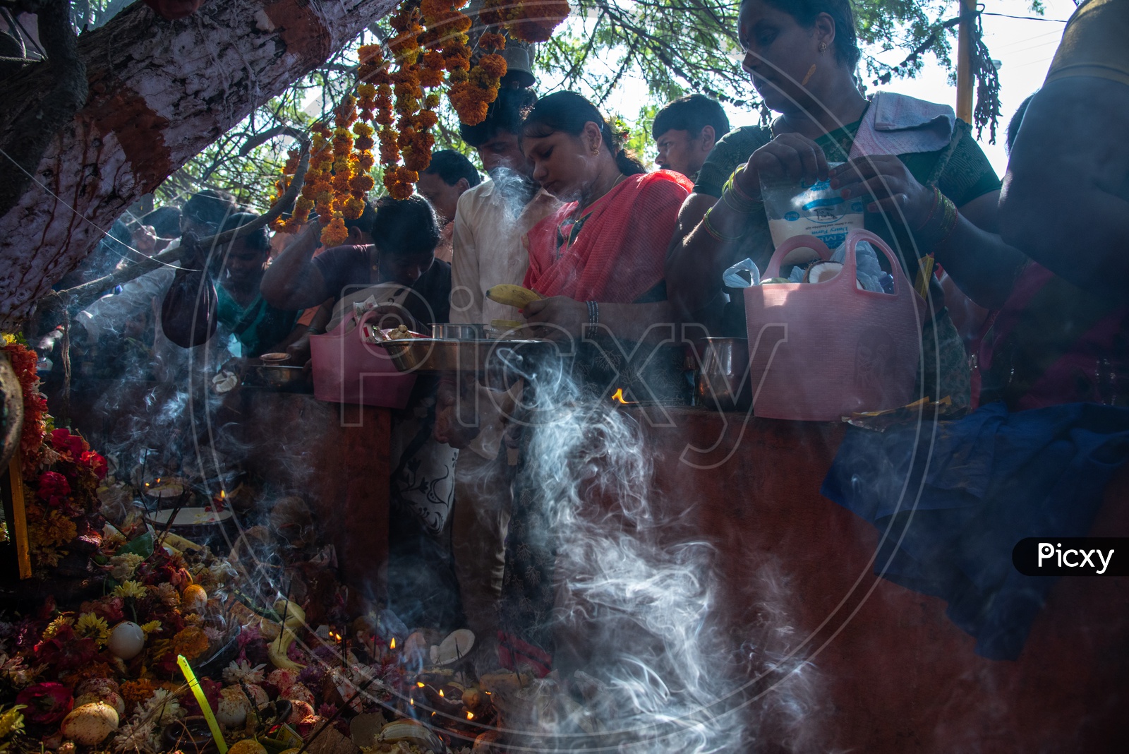 Nagula Panchami/Chavithi, observed on the fourth day of deepawali observed by married women and men offering Eggs and Milk to Snakes especially Cobra's near snake pits