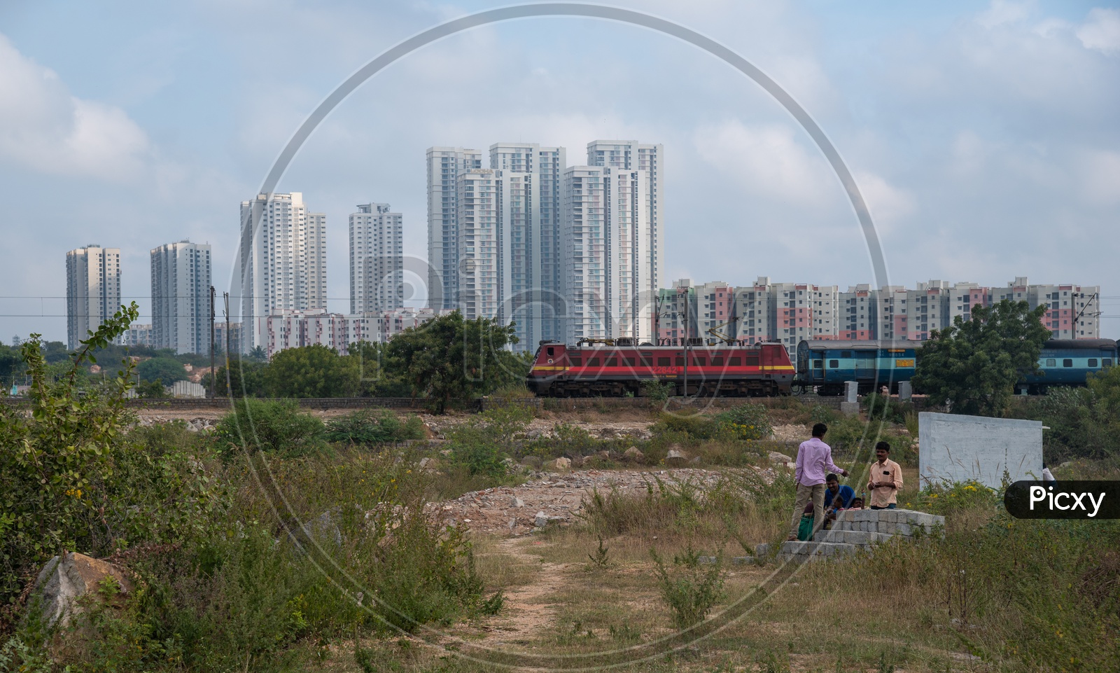 Indian Railways Train with Lodha Apartments in the Background