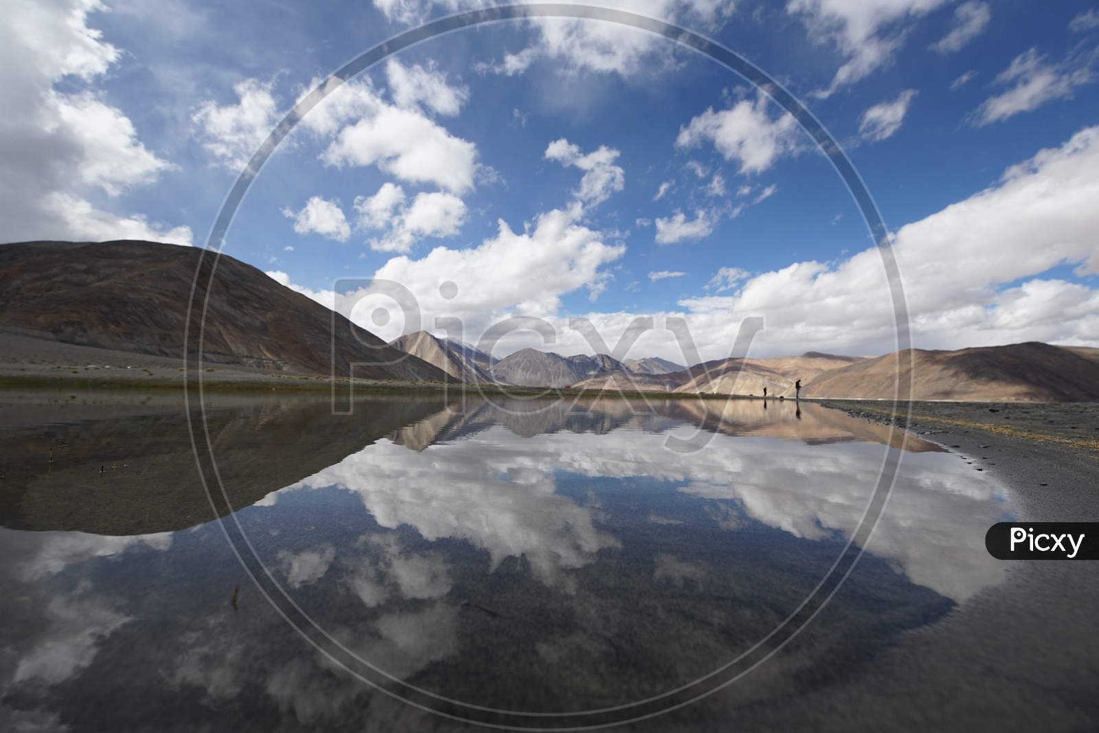 Beautiful Landscape of Pangong Lake with Mountains and Clouds / Reflection Mountain Image
