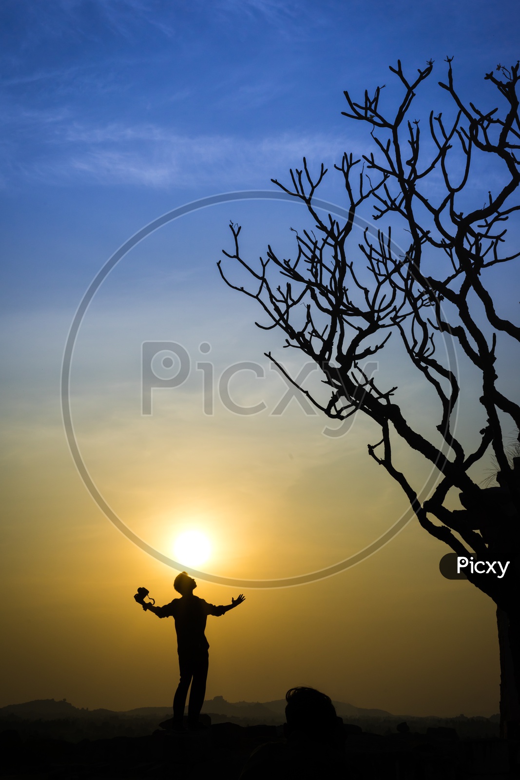 Silhouette picture of  Man in Hampi