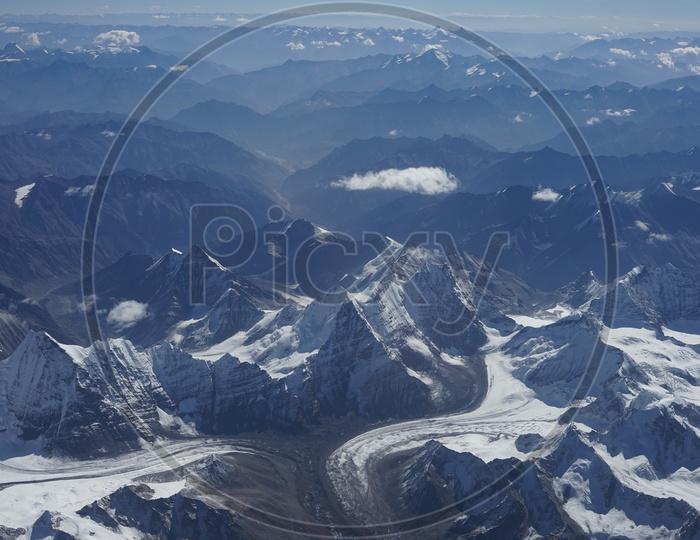 Beautiful Landscape of Himalayan mountains captured from aircraft /  Himalayas in Aerial View / Snow Capped Mountains