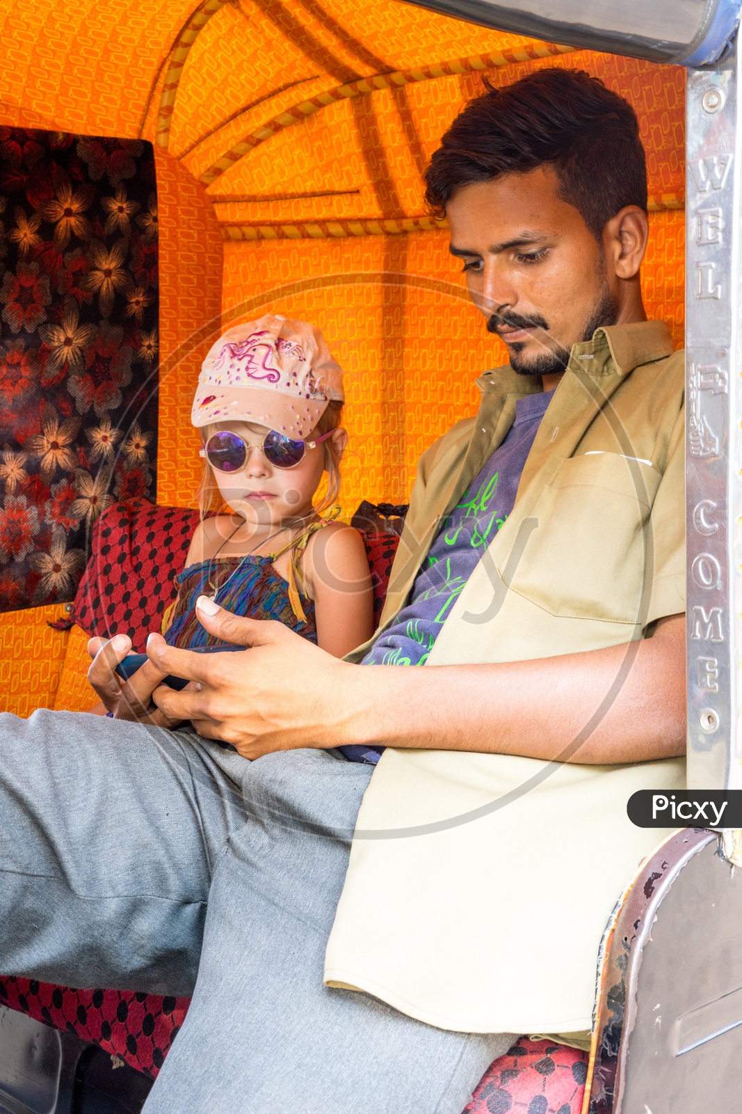 Foreign Tourist Child and Auto Driver at Hampi