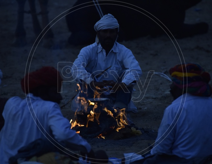 Rajasthani Men at Camp fire, Pushkar Camel Fair, 2018