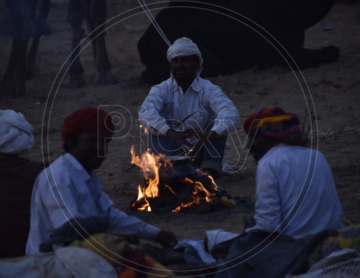 Rajasthani Men at Camp fire, Pushkar Camel Fair, 2018