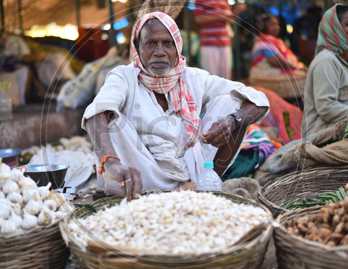 Garlic Seller at  Local Vegetable Market/Rythu Bazar