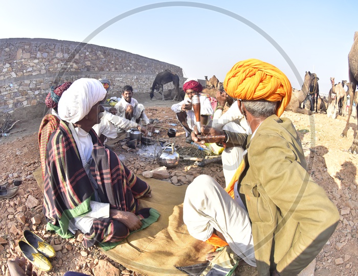 Rajasthani Men cooking food at Pushkar Camel Fair