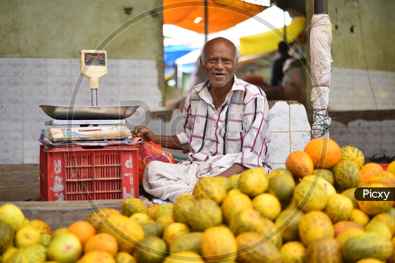 Happy Vegetable Seller at Local Market/Rythu Bazar