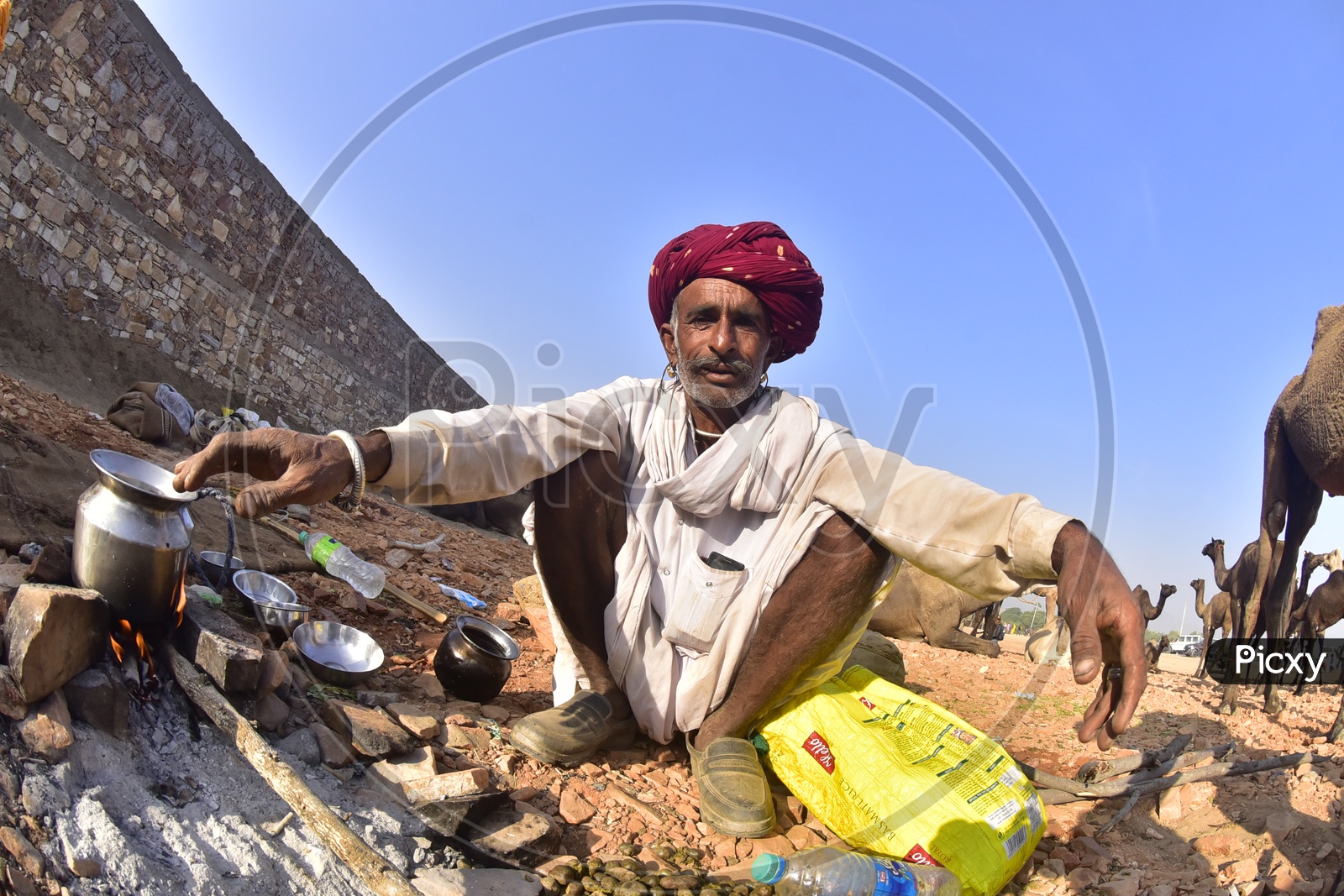 Rajasthani Man cooking at Pushkar Camel Fair