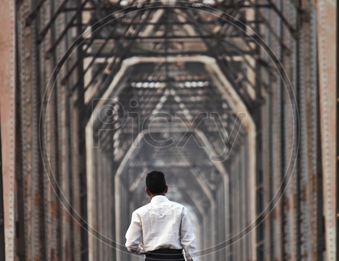 Man commutes through railway track to work