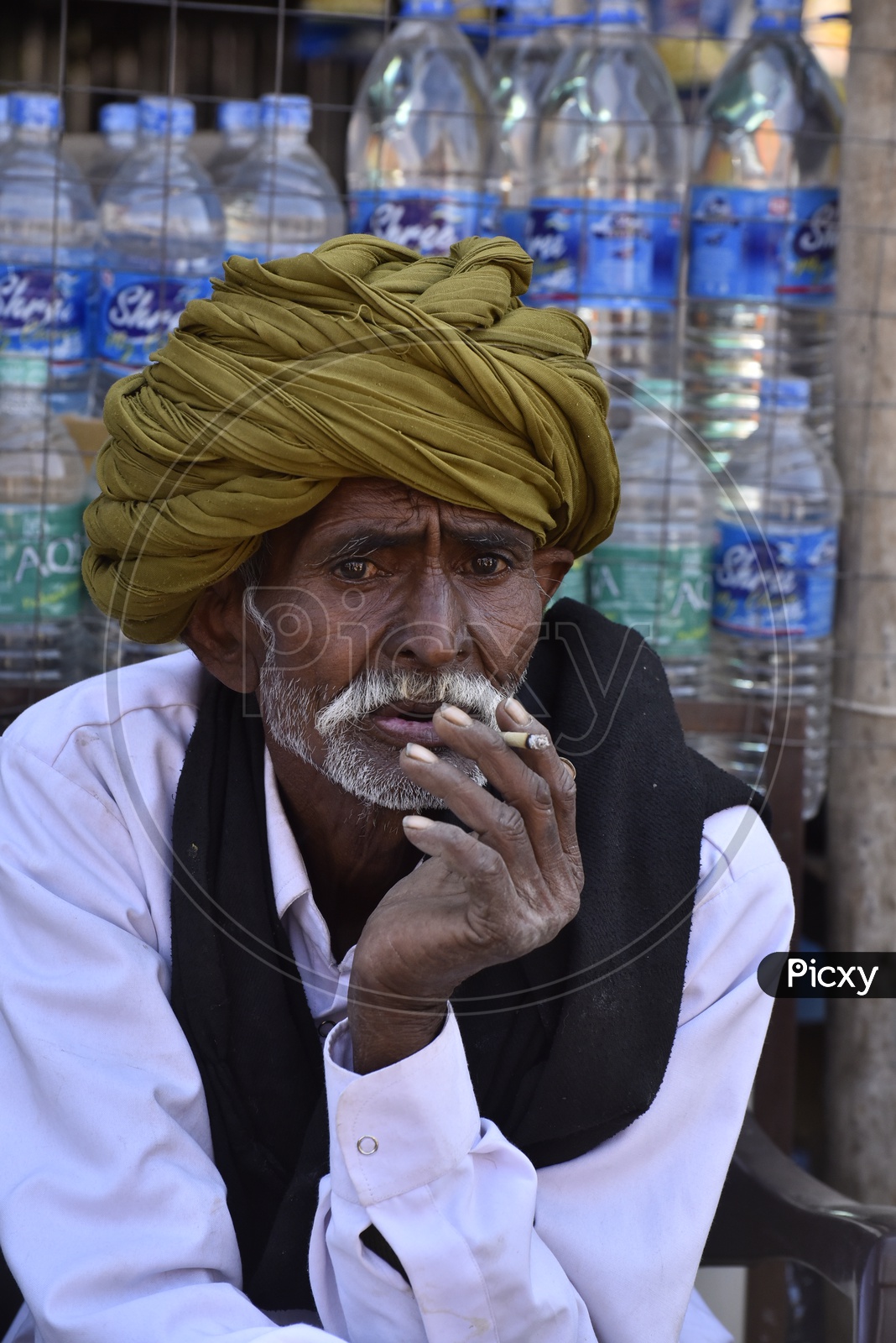 Rajasthani Old Man Smoking in Pushkar Camel Fair