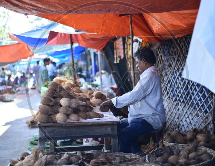 Coconut Seller at Local Vegetable Market/Rythu Bazar