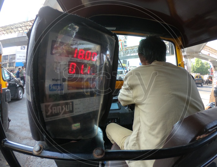 Auto Rickshaw with a Meter working
