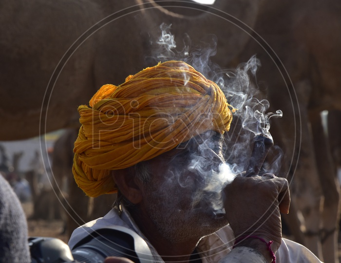 Rajasthani Man Smoking at Pushkar Camel Fair