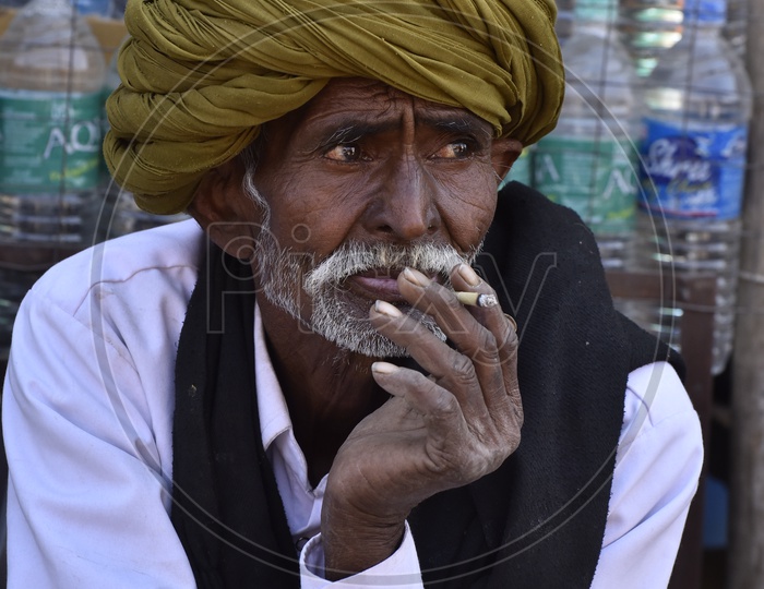 Rajasthani Old Man Smoking in Pushkar Camel Fair