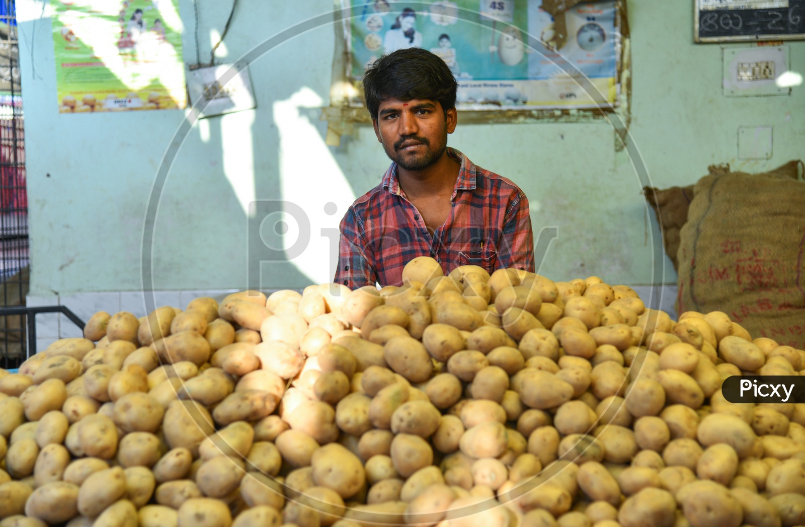Potatoes Seller at Local Vegetable Market/Rythu Bazar