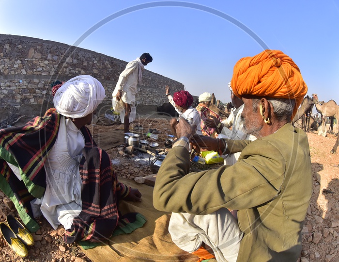 Rajasthani Men cooking food at Pushkar Camel Fair