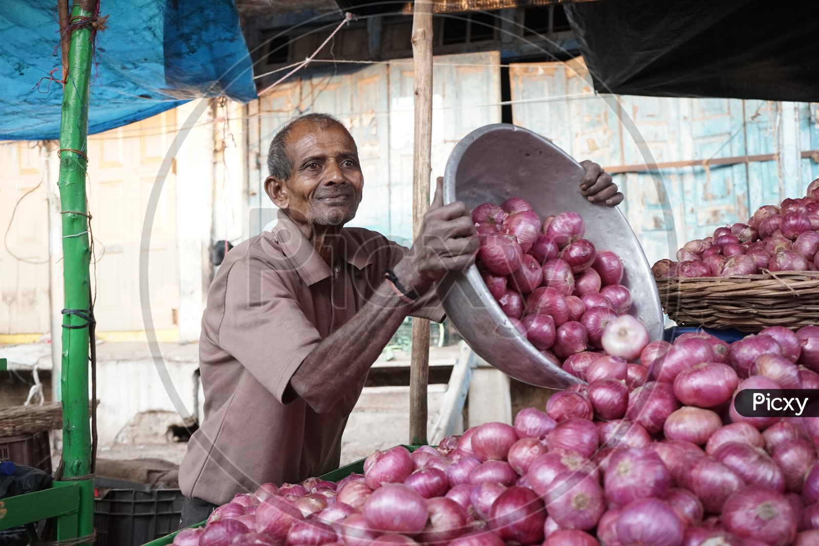 Smile on face , tears with onion