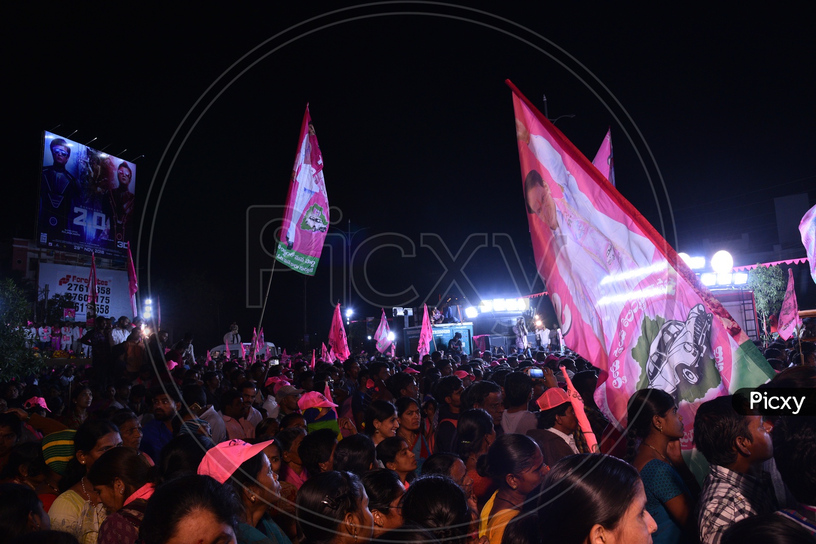 People Cheering By Waving TRS Party  Flags in Election Campaign Rally During Election Campaign 2018