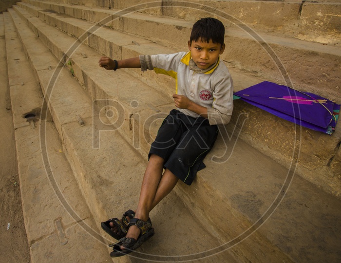 Boy With Kite On Bank Of River Ganga / Varanasi Local Children