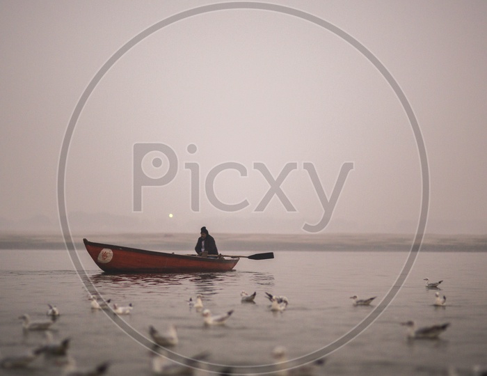 Boat Sailing  in Ganga River Varanasi / Siberian Birds in Varanasi/ Migratory Birds in Varanasi  / Boat Transport in Varanasi