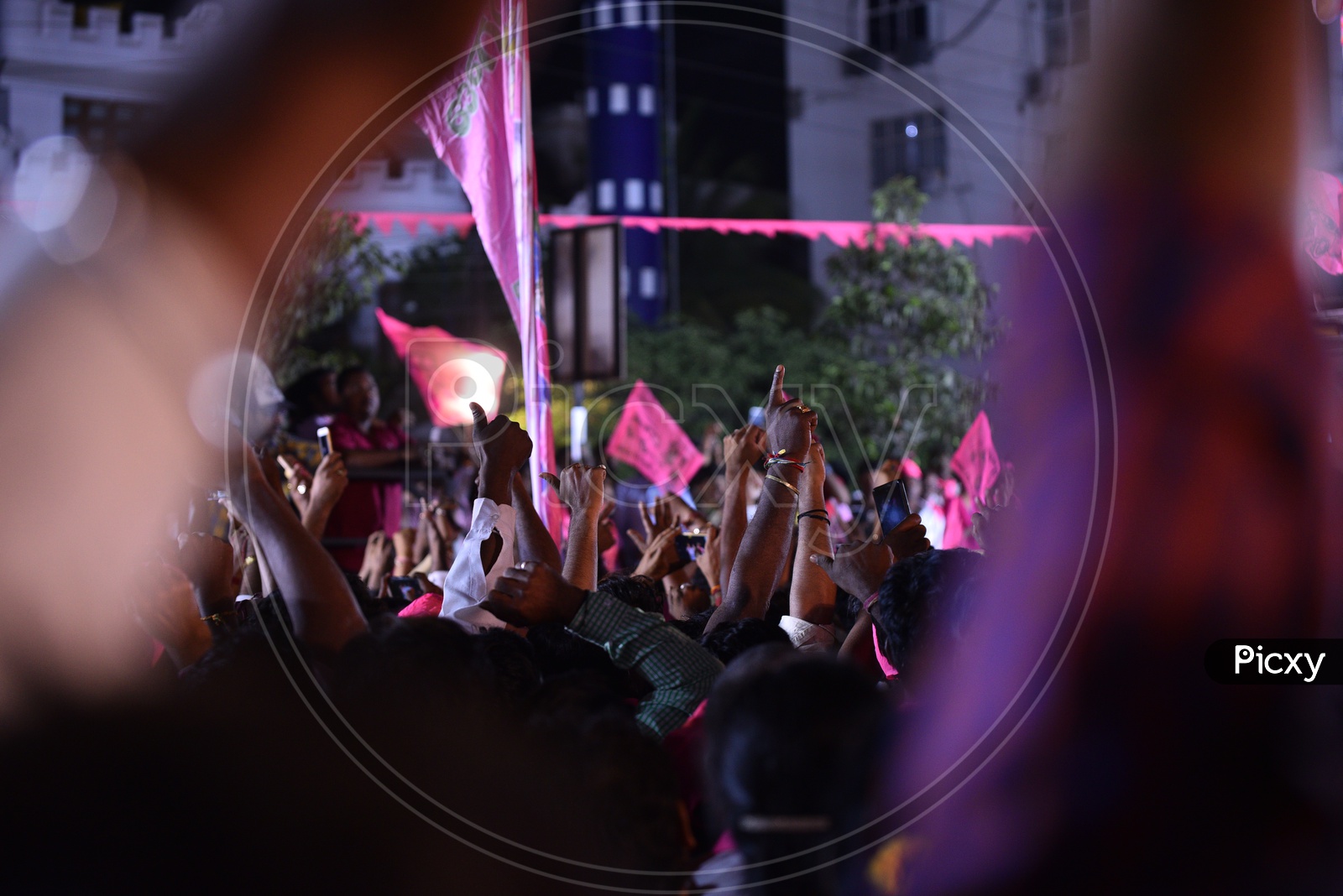 TRS Party Pepole Cheering The Gathering by Waving TRS Party Flags During The Election Campaign Rally 2018